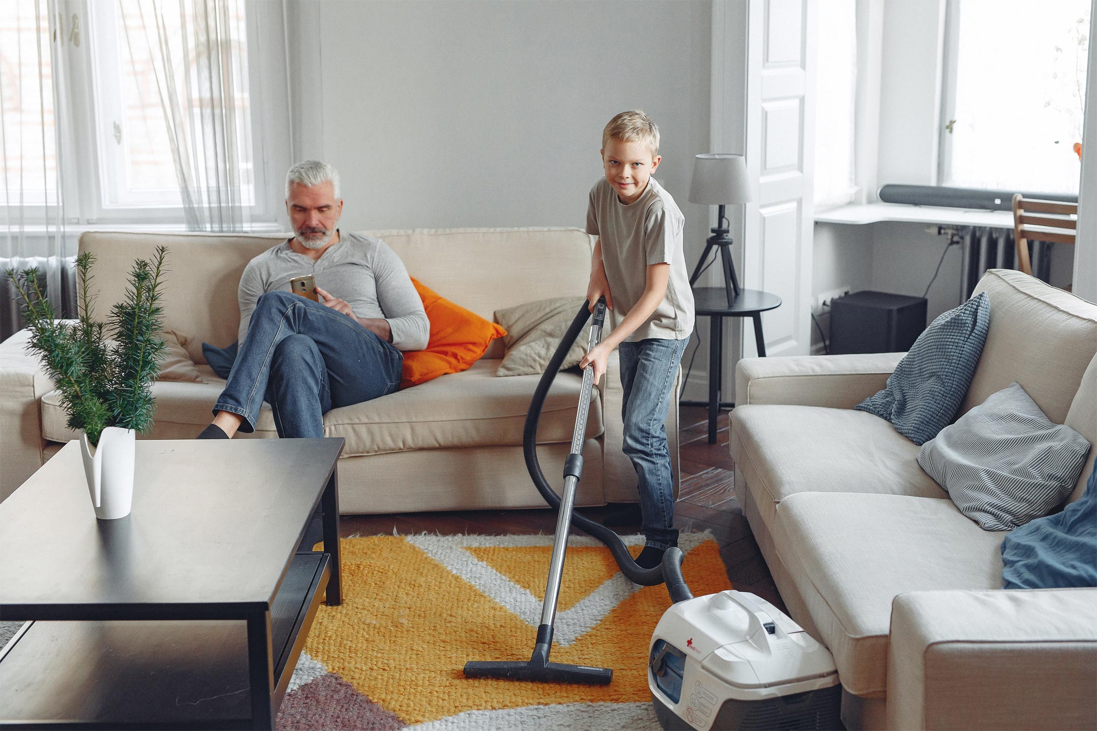 boy-cleaning-vaccuming2160