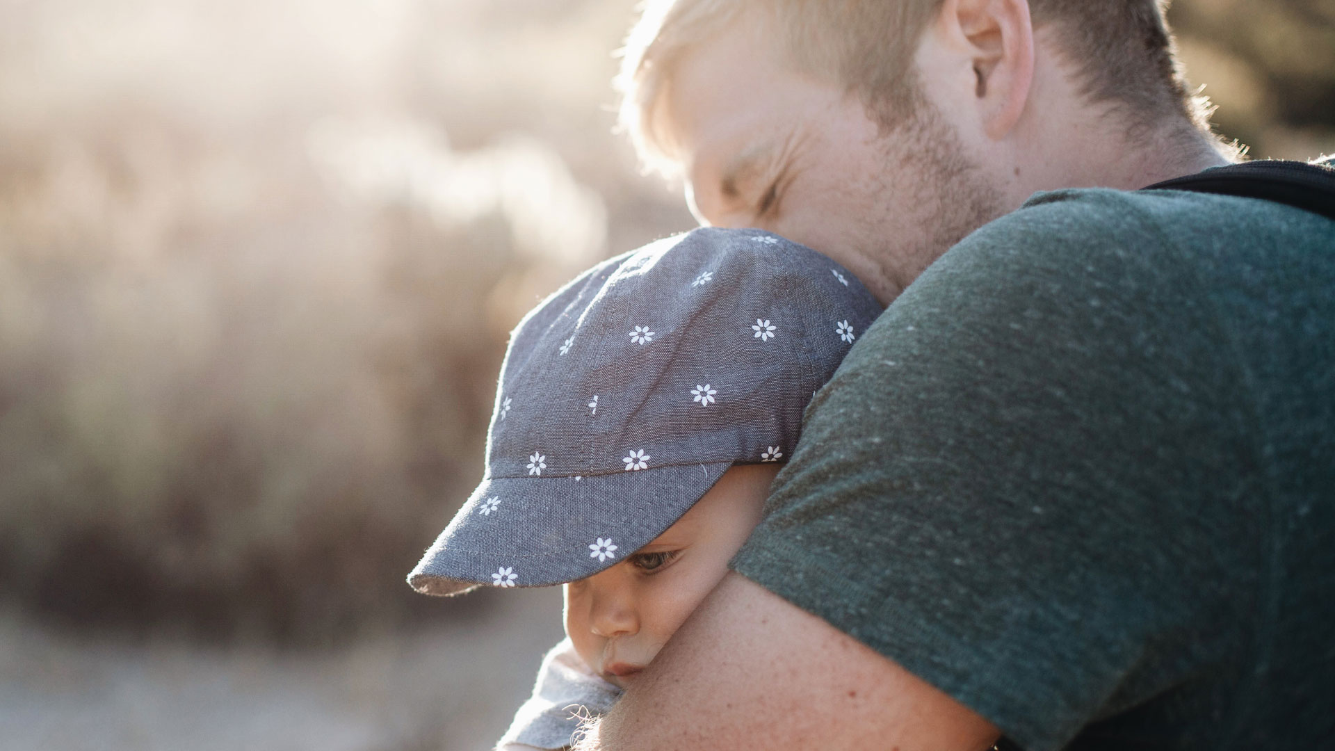 Dad embraces son