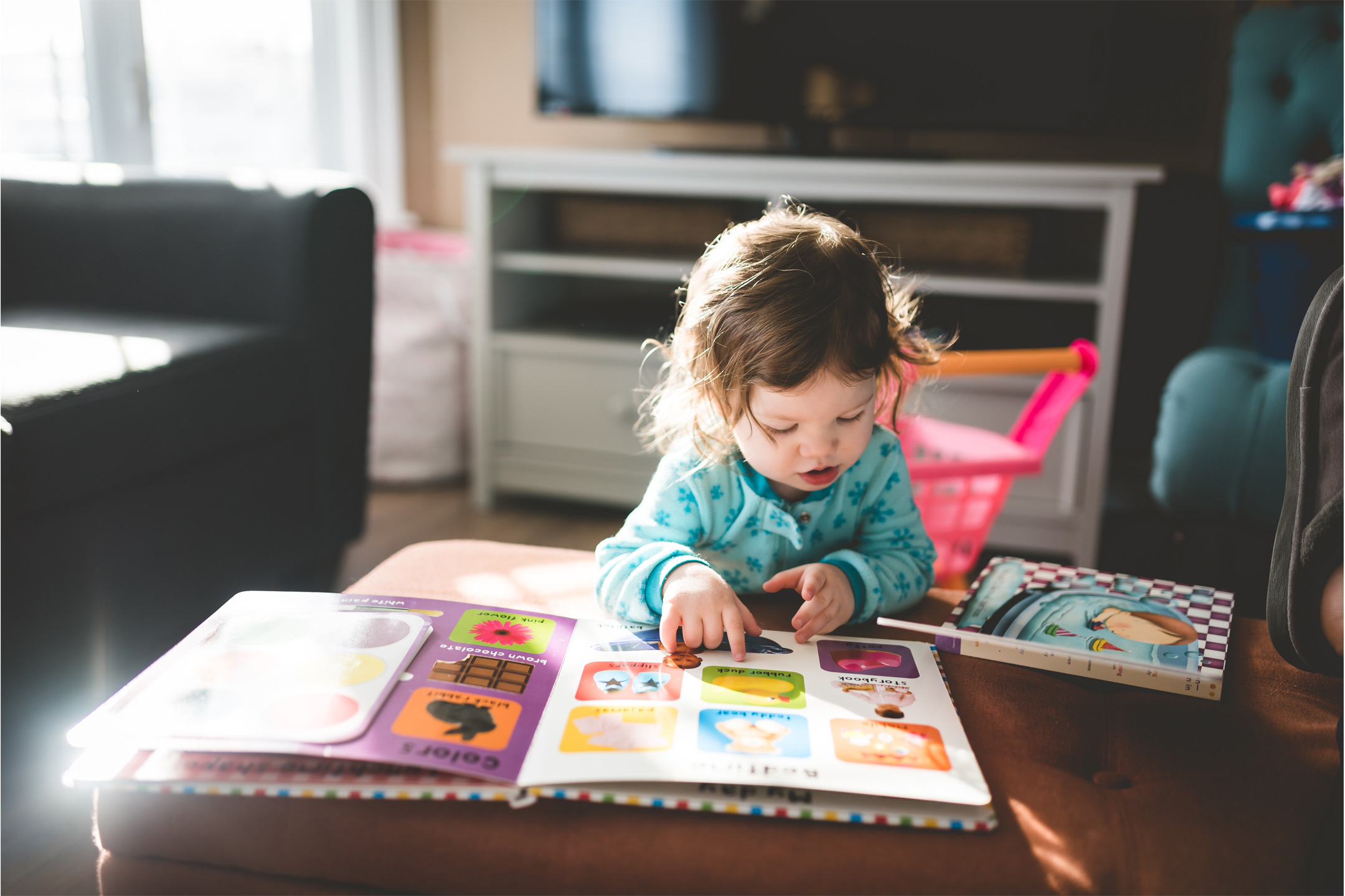 toddler-withbook-on-table2160