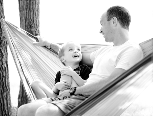 father-son-hammock-chatting-mono2160