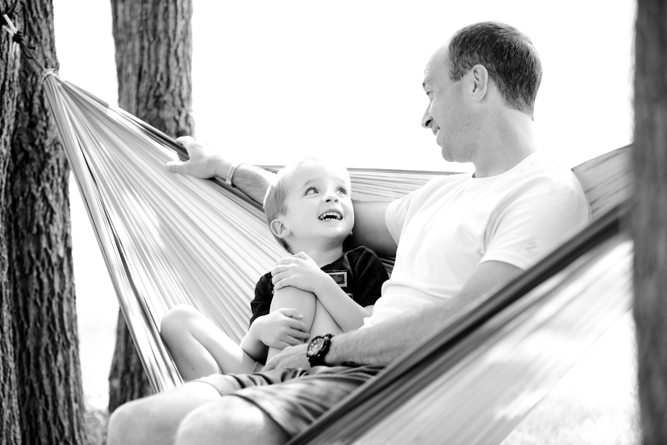 father-son-hammock-chatting-mono2160