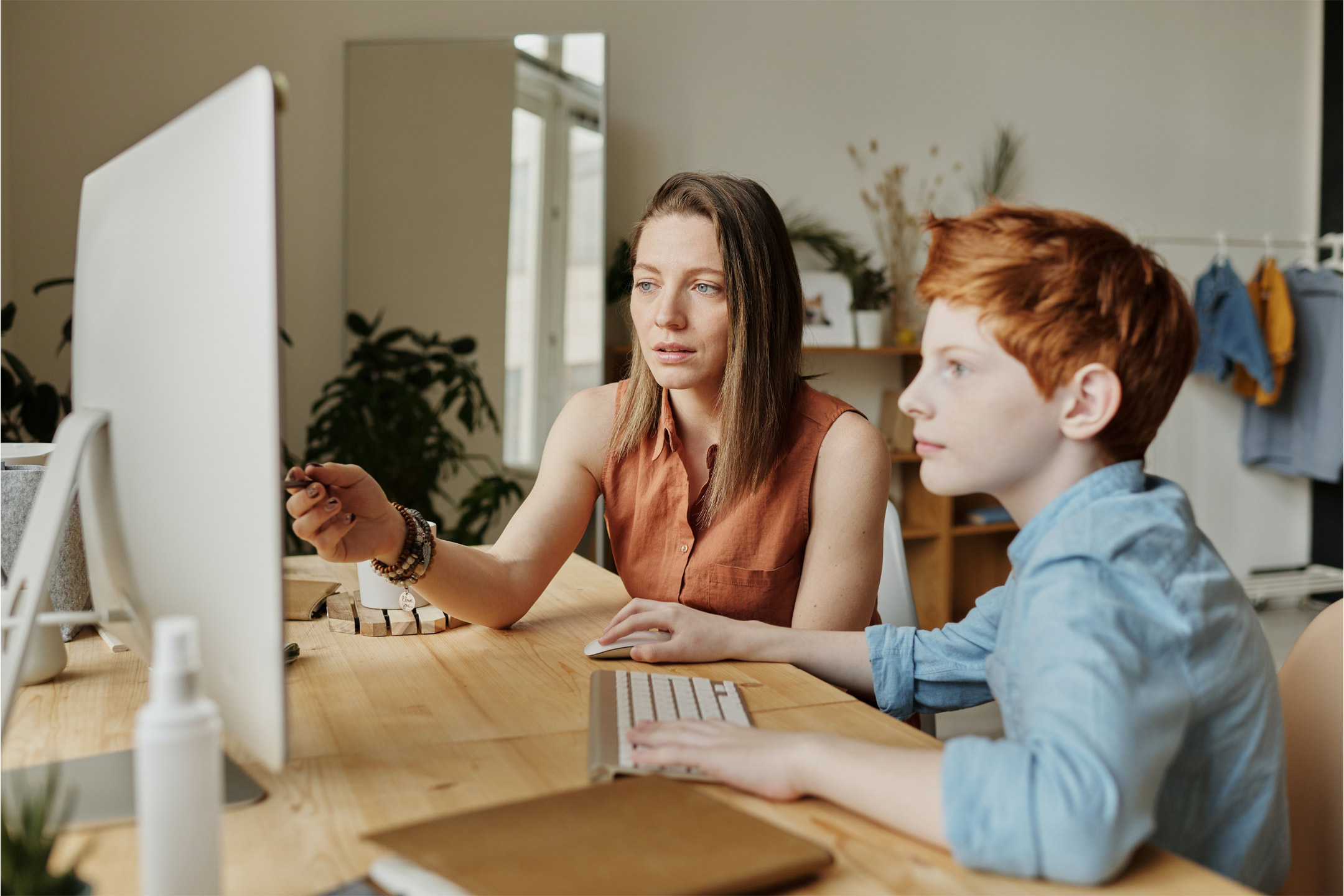 woman-teaching-boy-home2160