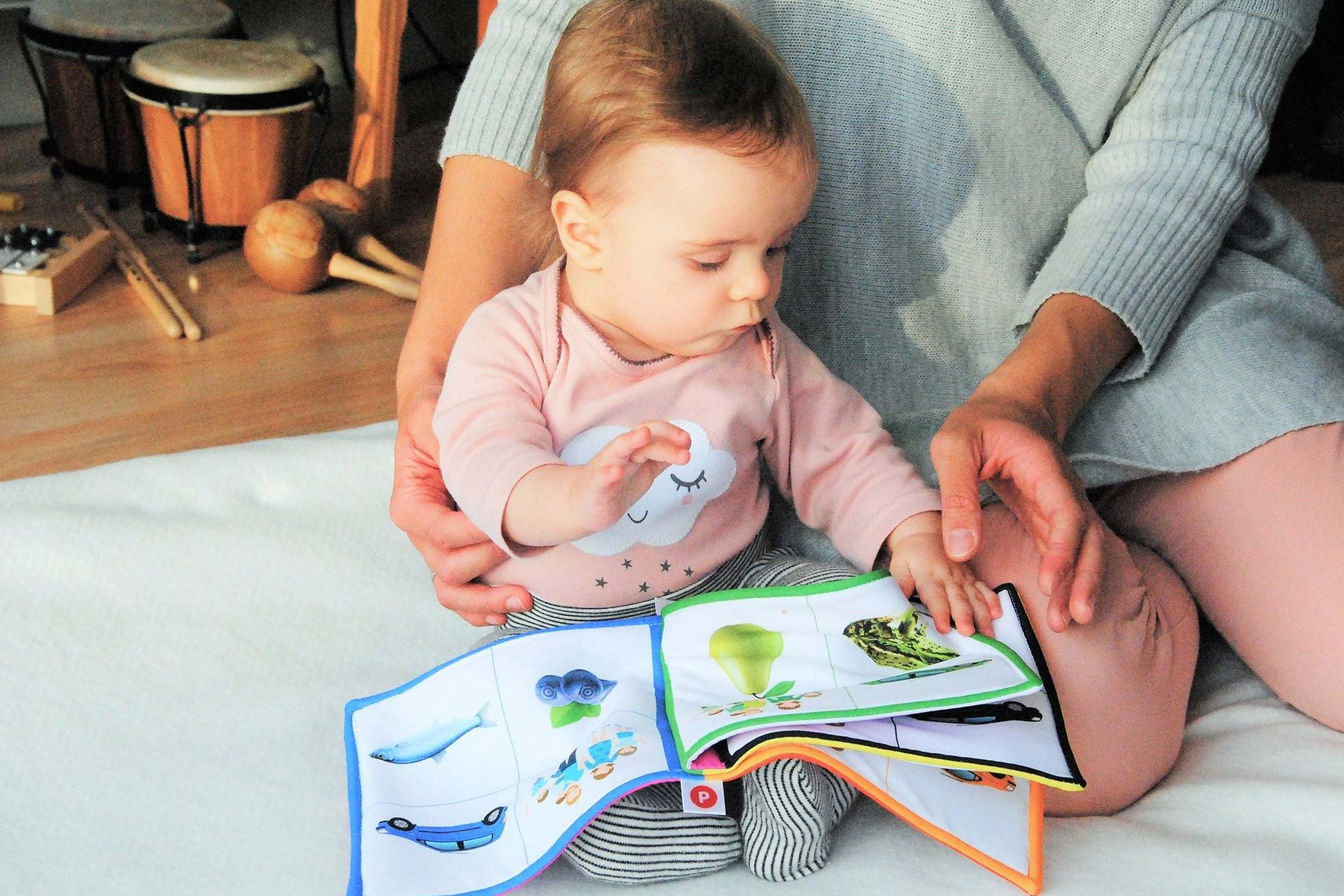 child-mum-reading-cloth-book2160