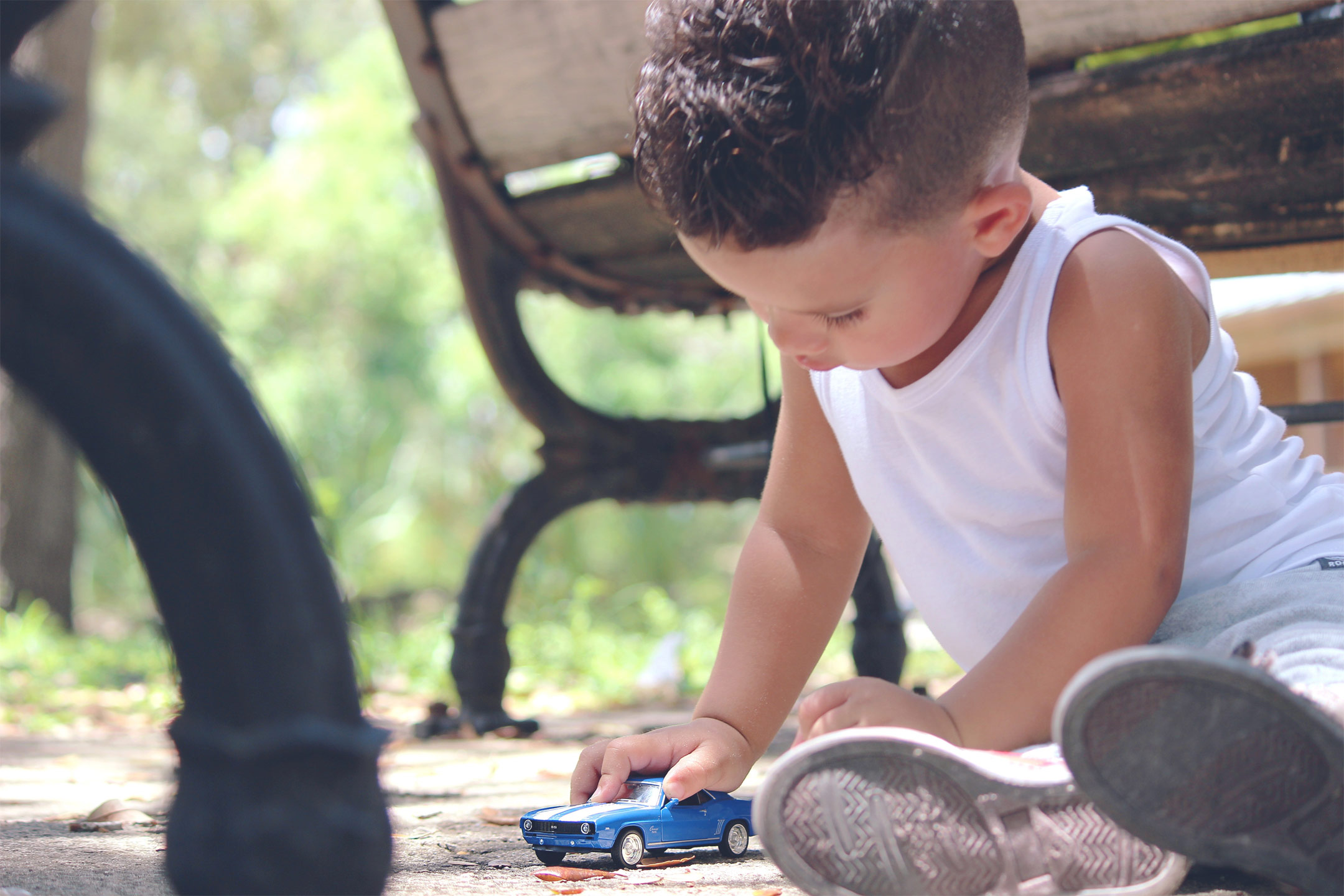 toddler-playing-with-toy-car2160