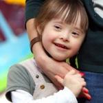 Down-syndrome-girl-happy-with-mother2160