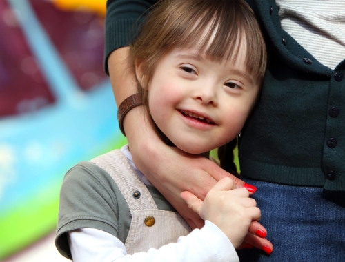 Down-syndrome-girl-happy-with-mother2160
