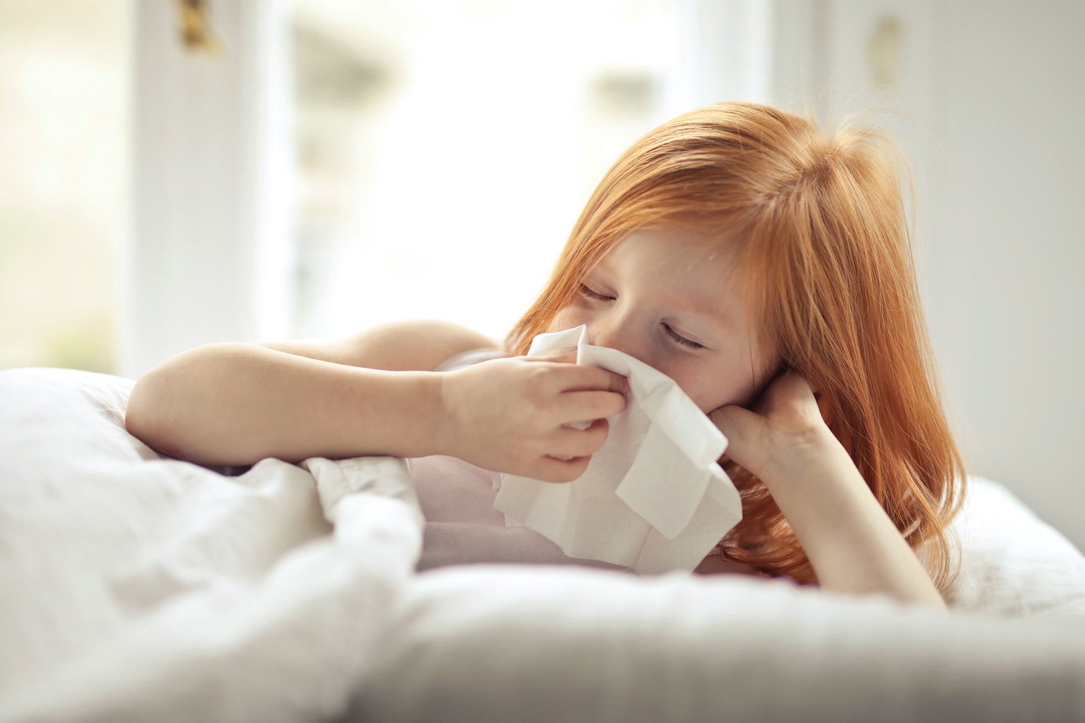 ill-preteen-girl-blowing-nose2160