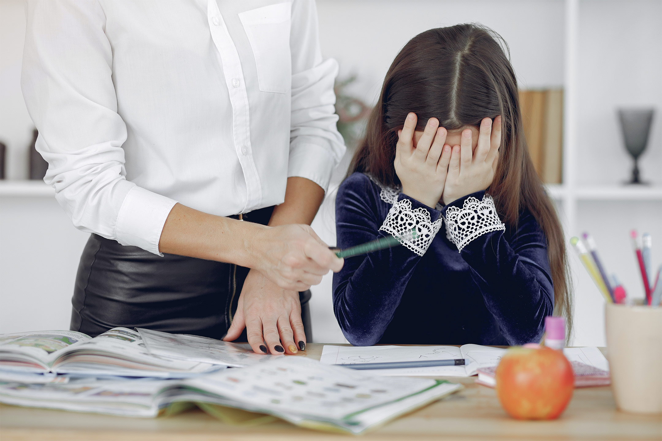 upset-girl-with-person-doing-homework2160