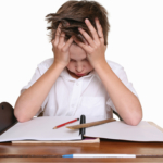 Stressed-child-at-school-desk2160