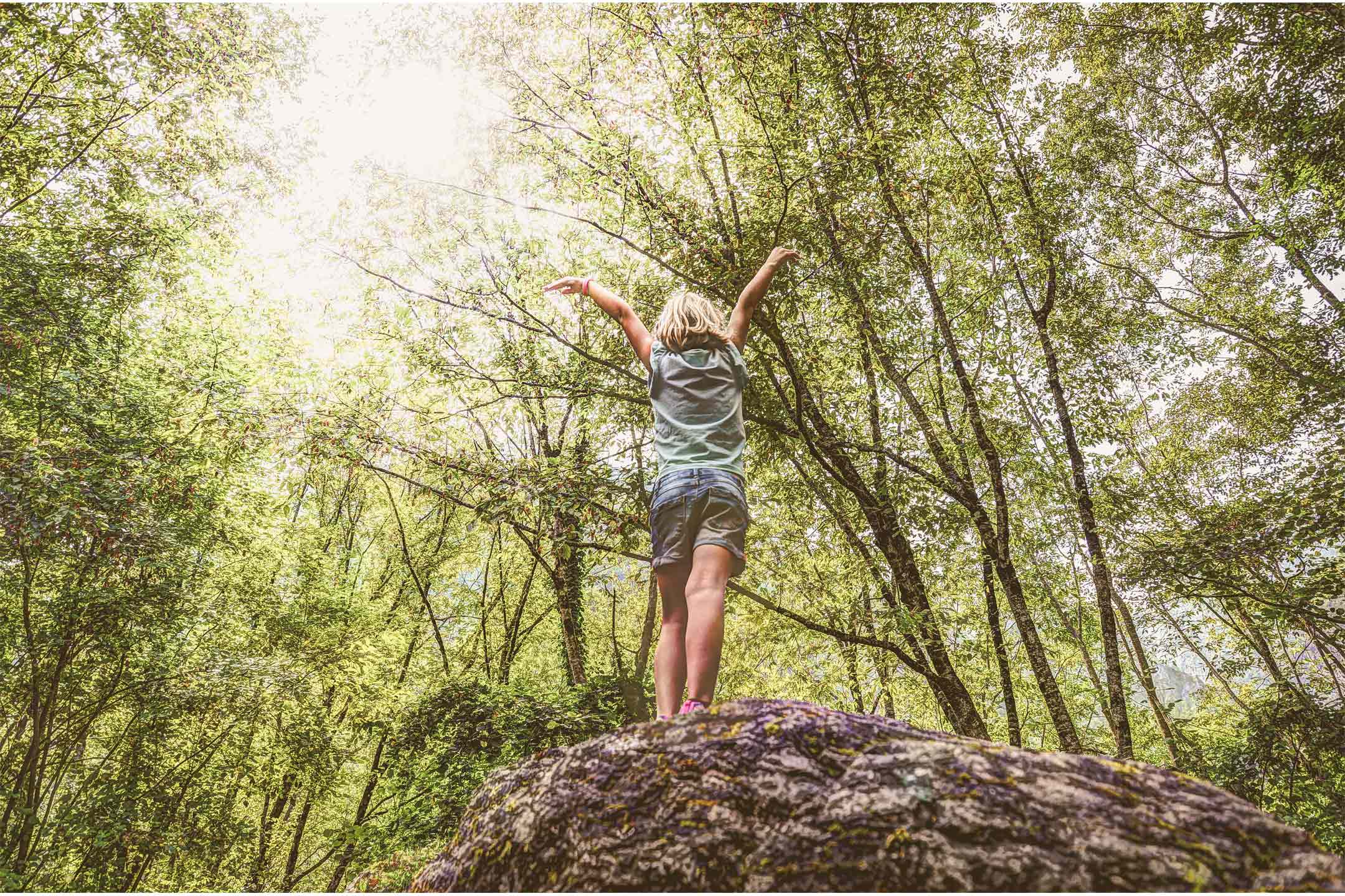 girl-on-rock-outside2160