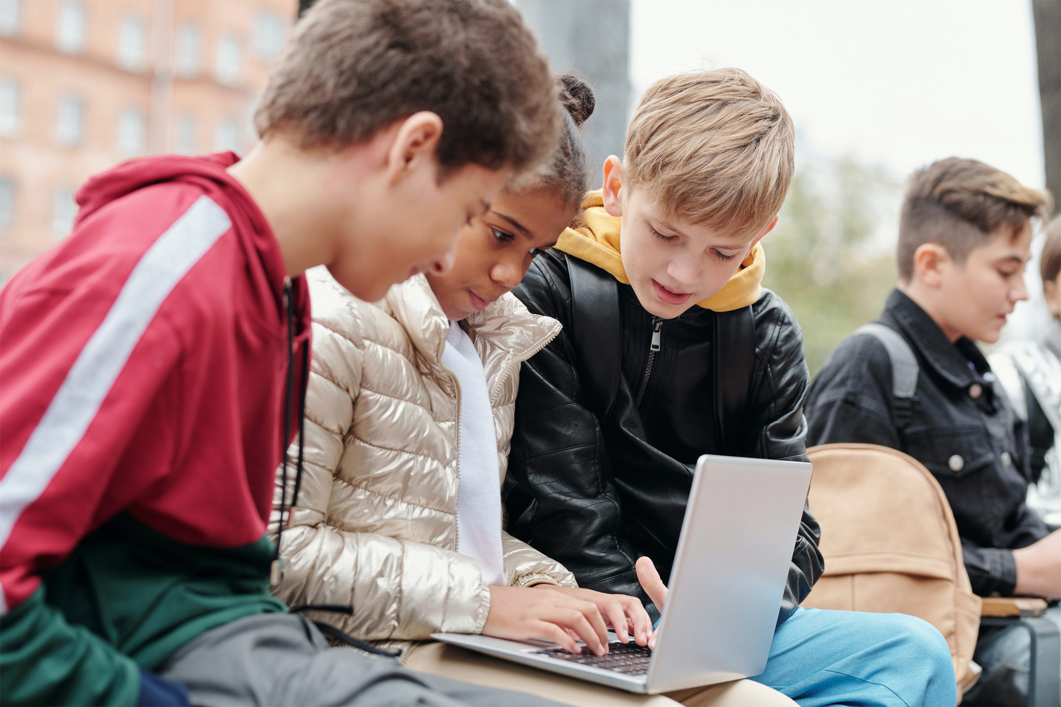 tween-looking-at-laptop2160