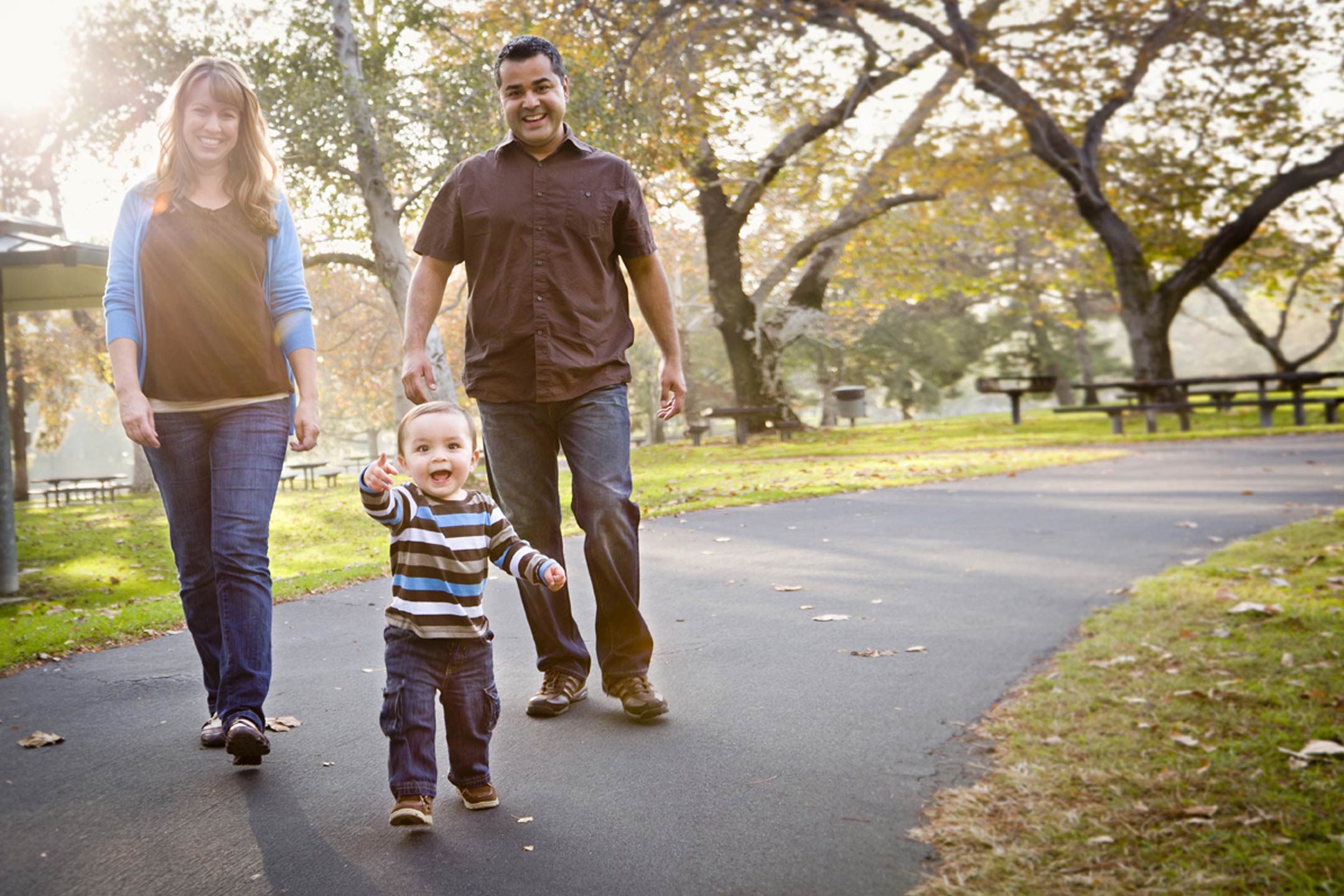 Family-walking-in-park-multicultural2160