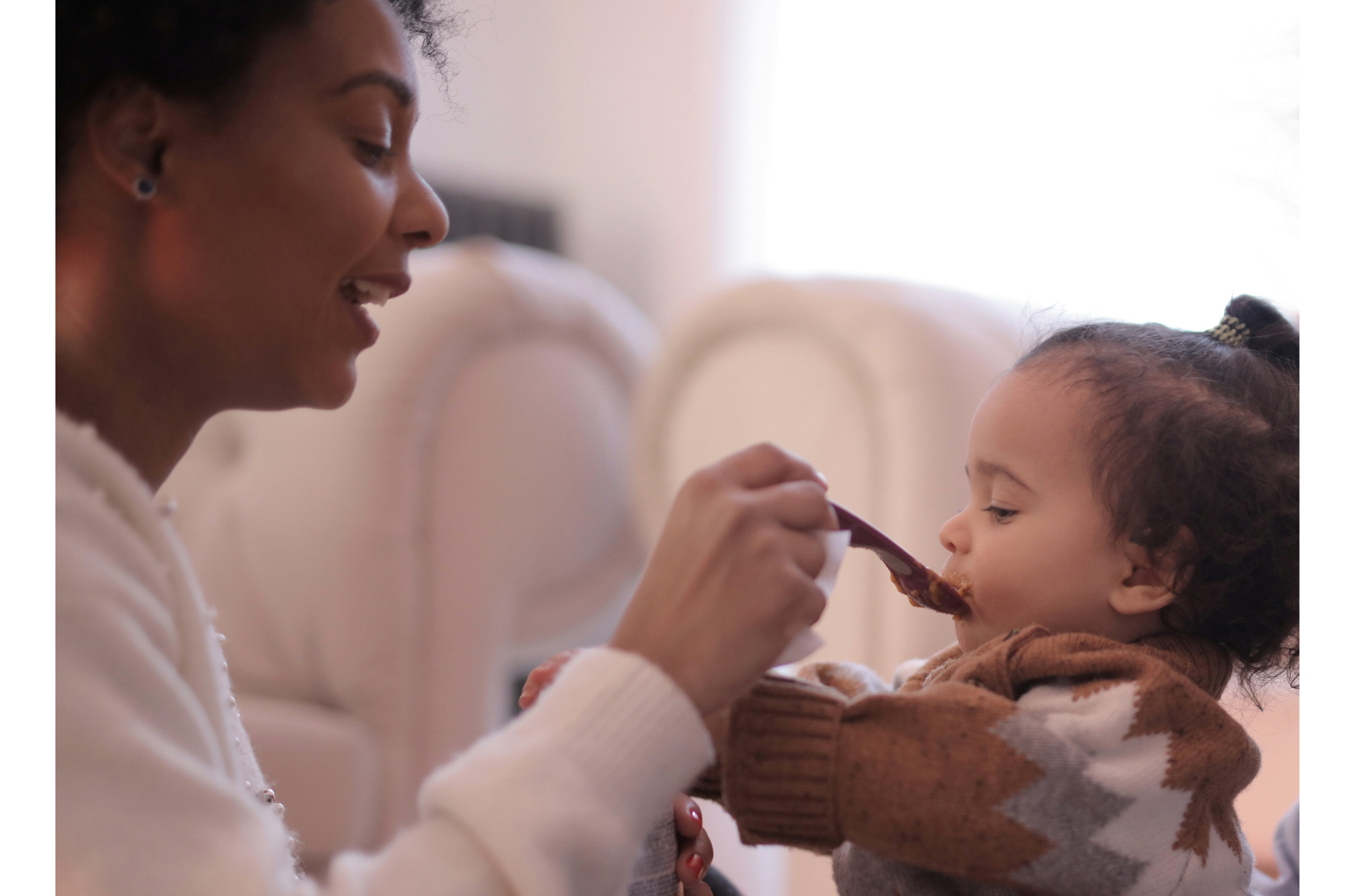 woman-feeding-her-child2160