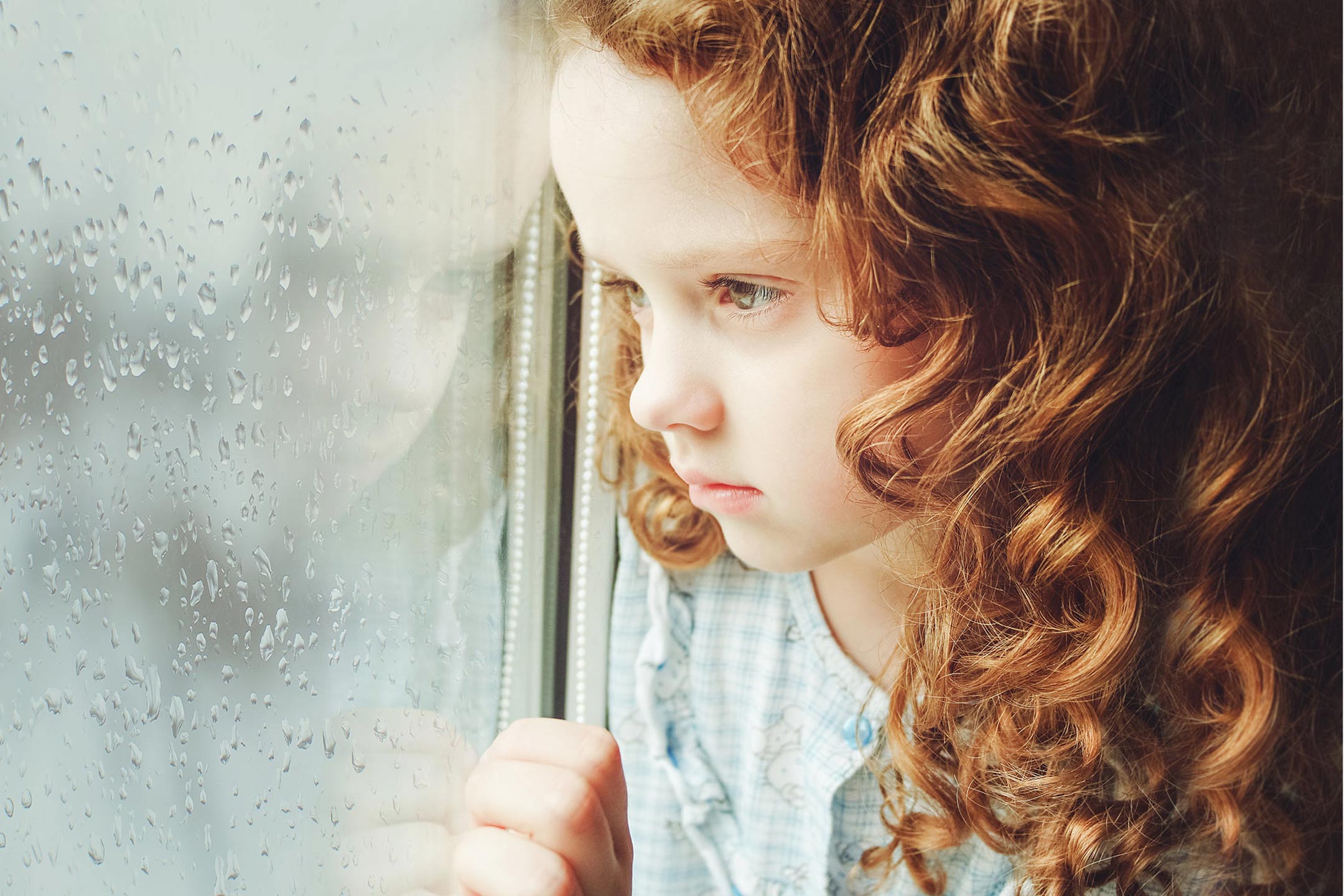 portrait-sad-girl-looking-out-window2160