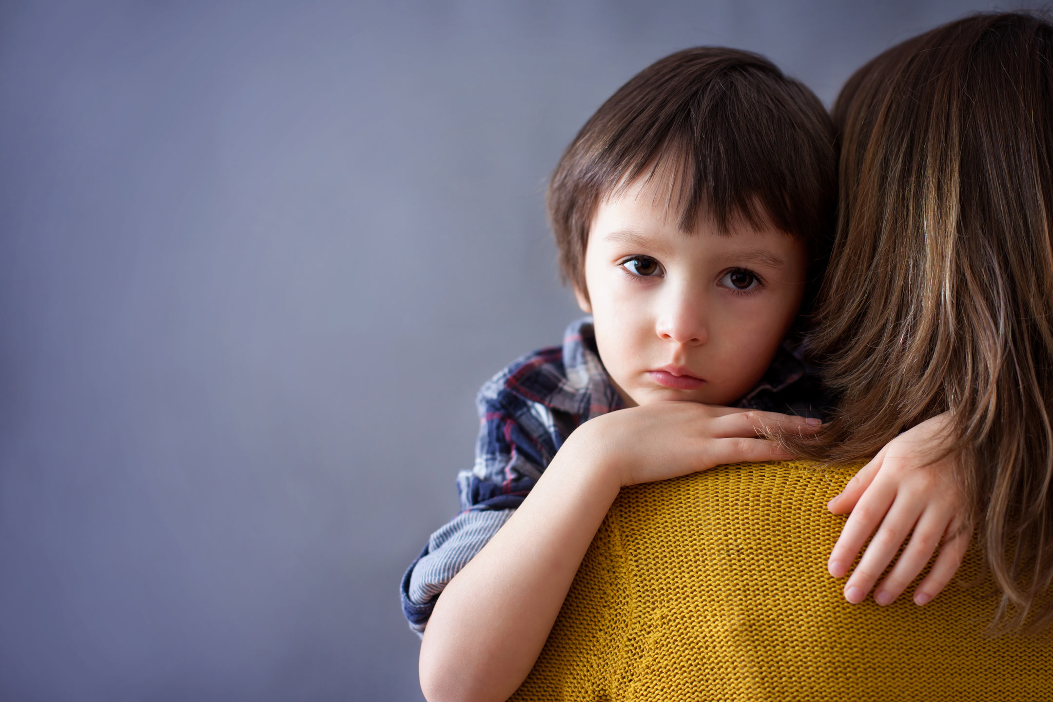 sad-little-boy-hugging-mother2160