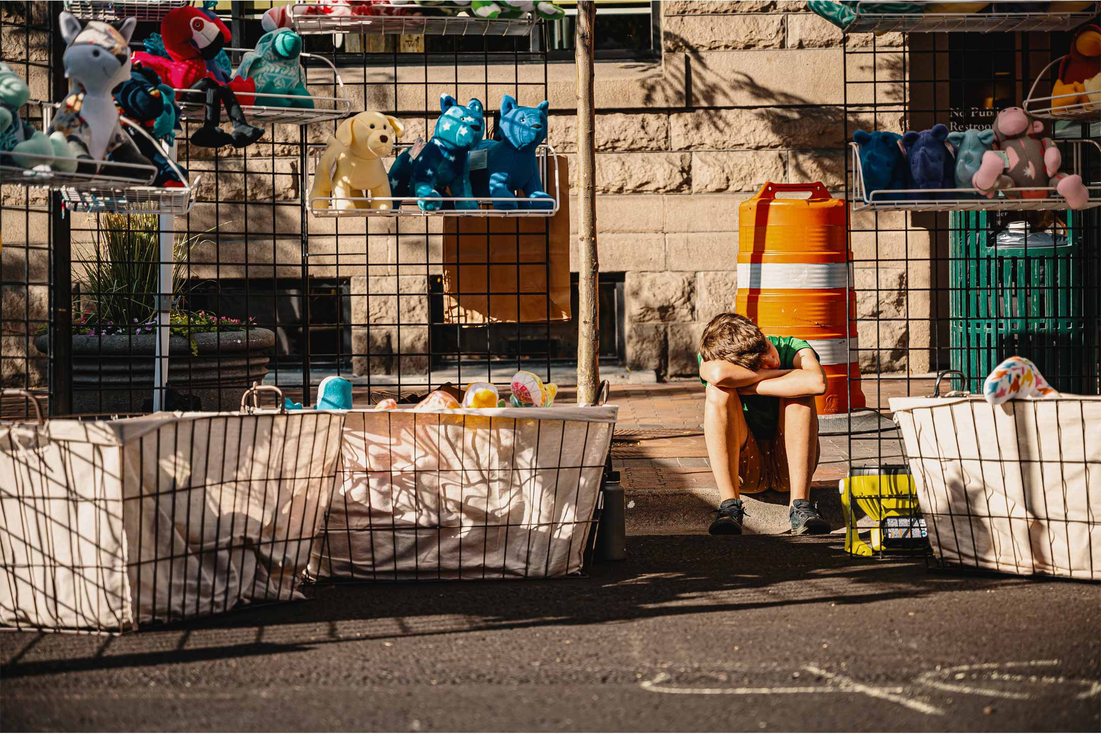 boy-selling-toys-outside2160