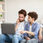 dad-and-son-learn-search-skills-on-line