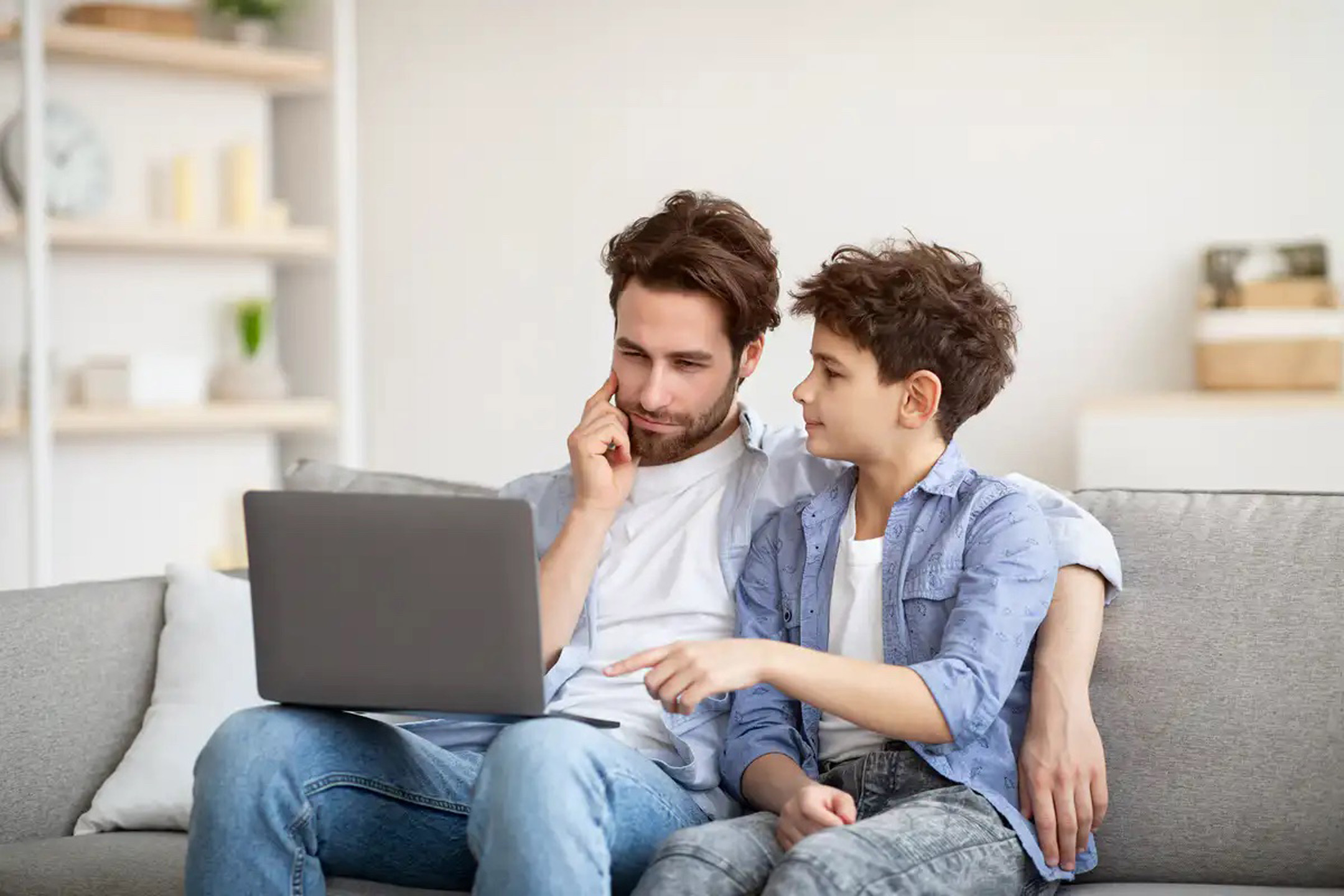 dad-and-son-learn-search-skills-on-line