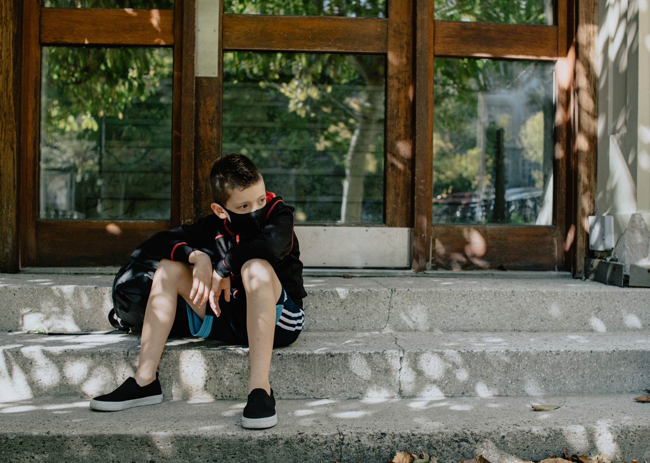 back-to-school-masked-boy-seated2160