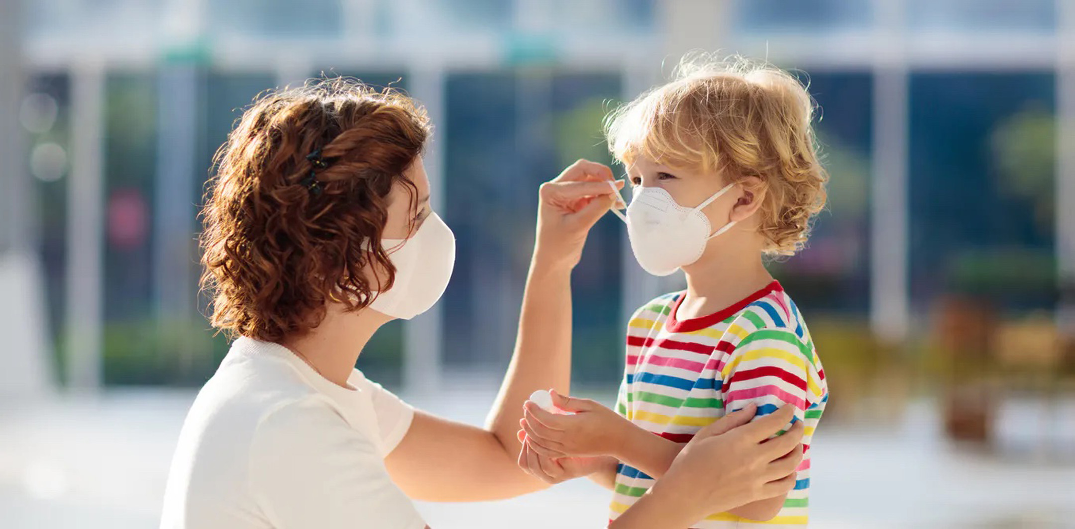 mother-getting-son-to-wear-mask2160
