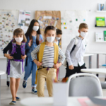 school-kids-entering-classroom-with-masks