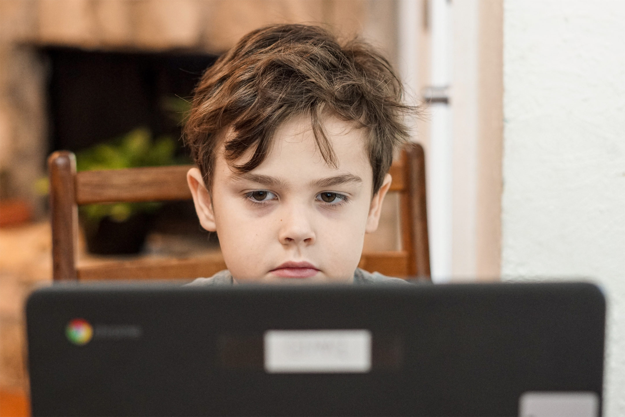 anxious-boy-child-looking-at-laptop2160