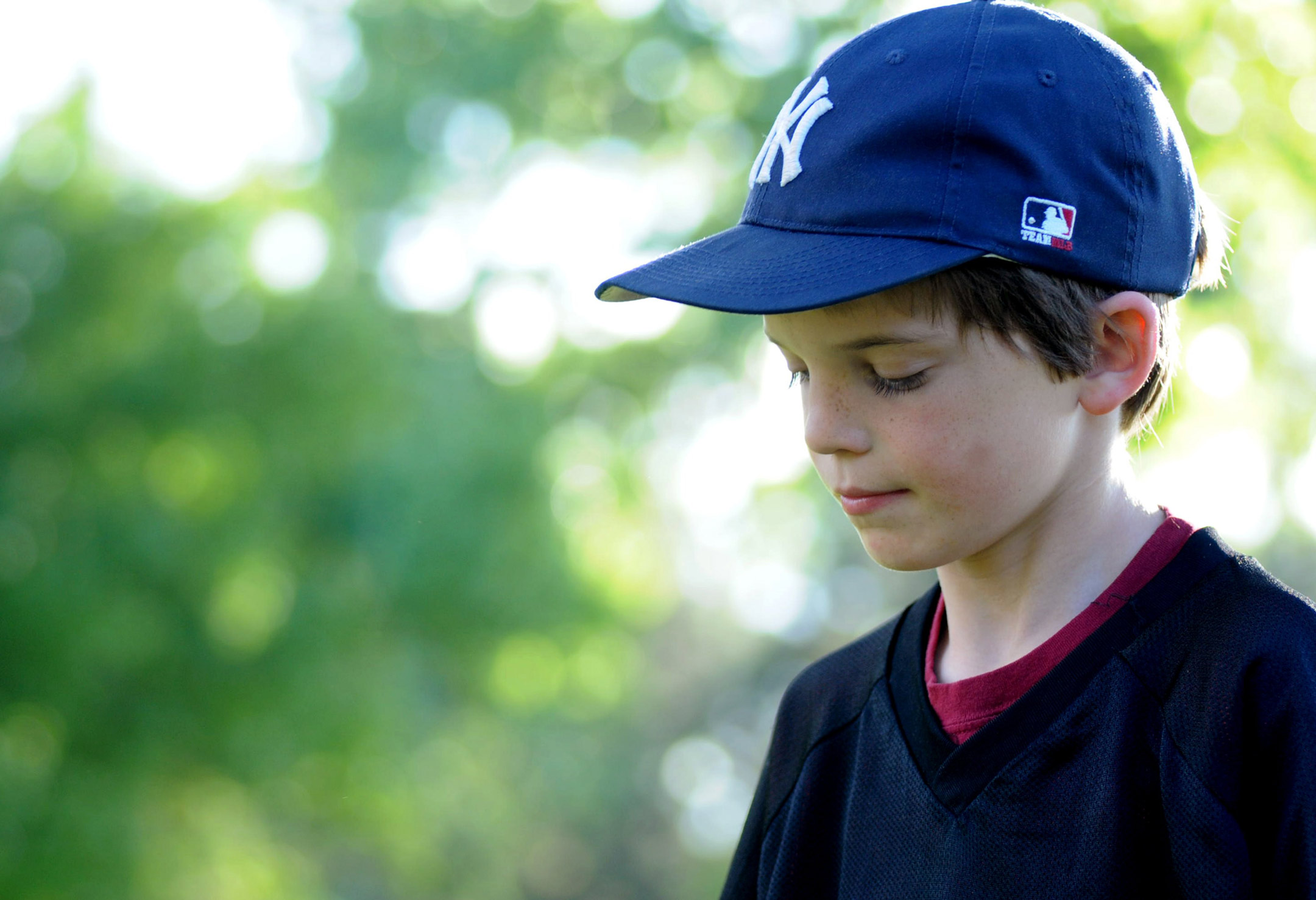 trauma-sad-boy-with-cap-on2160