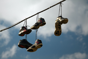 shoes hanging from wires small