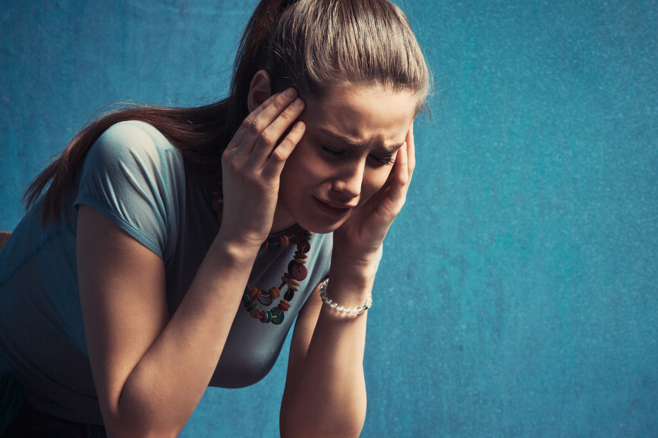 woman-upset-headache260
