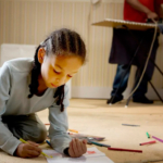 child-in-poverty-drawing-on-floor2160